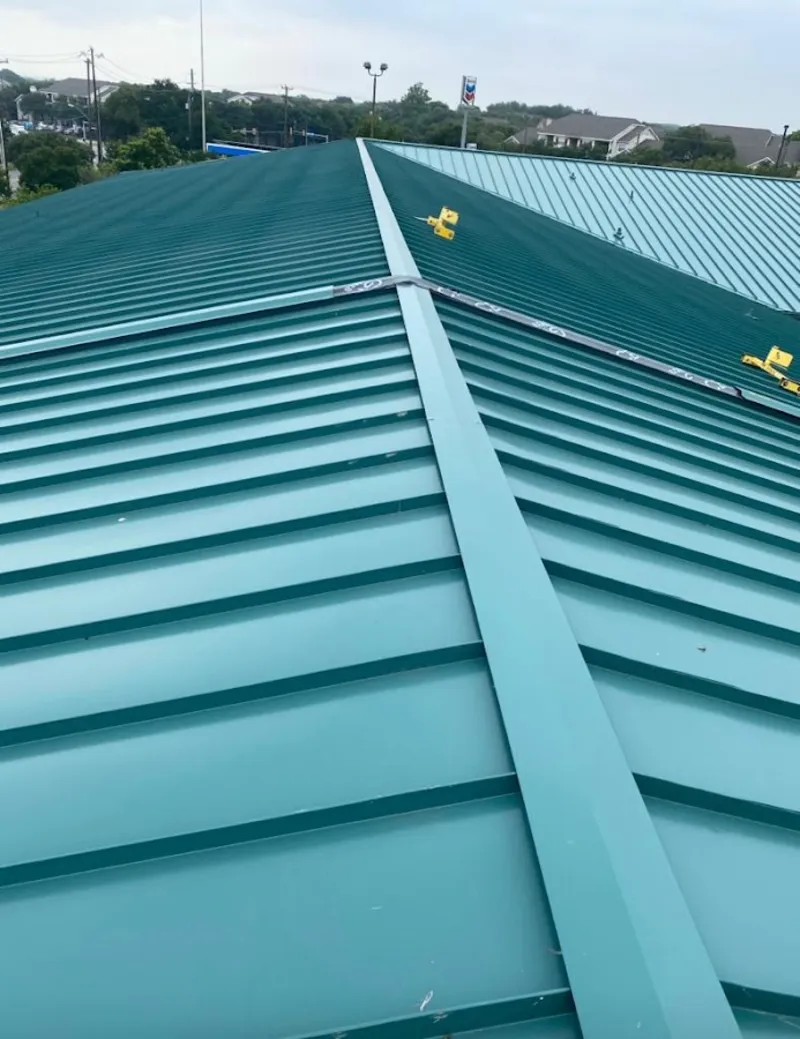Green commercial metal roof ridge and valley for Metal Roof Repair in Bangor